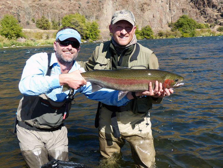 A client with a Deschutes River Steelhead